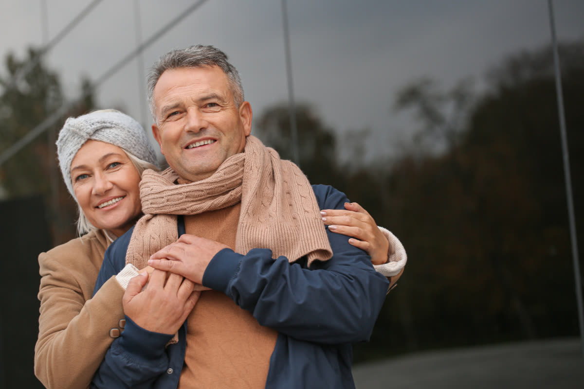 Happy mature couple together outdoors